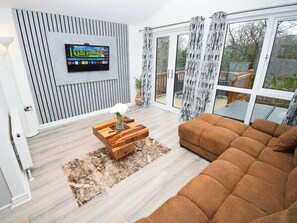 TV - Attractive two bedroom, two bathroom lodge, with hot tub. (Water Yeat, Cumbria)