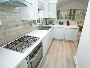 Private kitchen - Attractive two bedroom, two bathroom lodge, with hot tub. (Water Yeat, Cumbria)