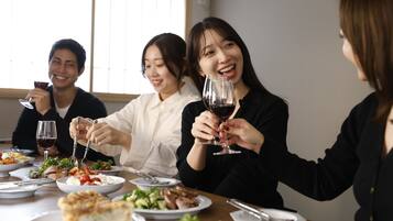 Triple Room | Private kitchen | Full-size fridge, microwave, stovetop, cookware/dishes/utensils