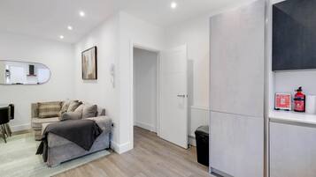 Family Apartment | Living area | 42-inch Smart TV with digital channels, Netflix, streaming services