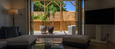 Luxury House, Ocean View | Living area | 56-inch Smart TV with cable channels