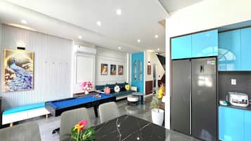 Comfort Villa, 4 Bedrooms, Air conditioning, Beach View | Living area | 32-inch flat-screen TV with cable channels