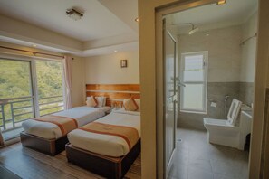 Habitación Deluxe con 2 camas individuales, vista al resort | Escritorio y wifi gratis