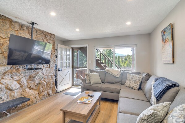 TV, books - 3BR Riverfront Retreat! Mtn Views, Community Perks (Winter Park)