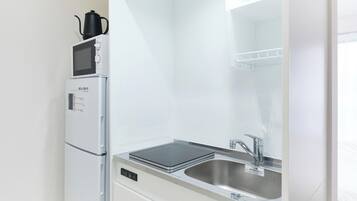 Fridge, microwave, stovetop, cookware/dishes/utensils
