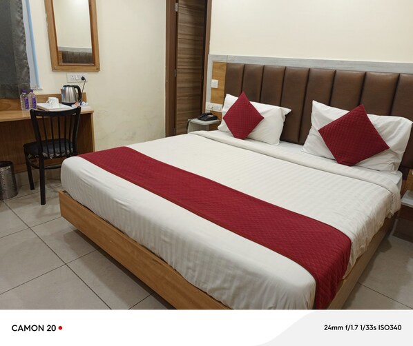 Deluxe Double Room, City View | Desk, laptop workspace, free WiFi
