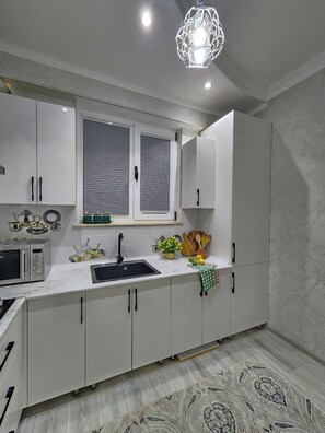 Comfort Apartment, Balcony, Courtyard View | Private kitchen - Zarafshan city 64 Tashkent (Tashkent)