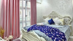 A bedroom with a bed, curtains, a ceiling fan, and a window. - Zarafshan city 64 Tashkent (Tashkent)