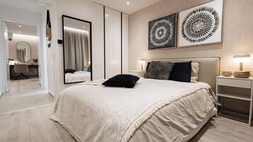 Apartment, Balcony, Beach View | Desk, laptop workspace, blackout drapes, iron/ironing board