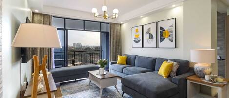 Classic Apartment, Balcony, City View | Living area | 55-inch Smart TV with cable channels, Netflix, first-run movies