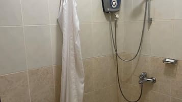 Standard Single Room | Bathroom | Shower, slippers, towels, soap