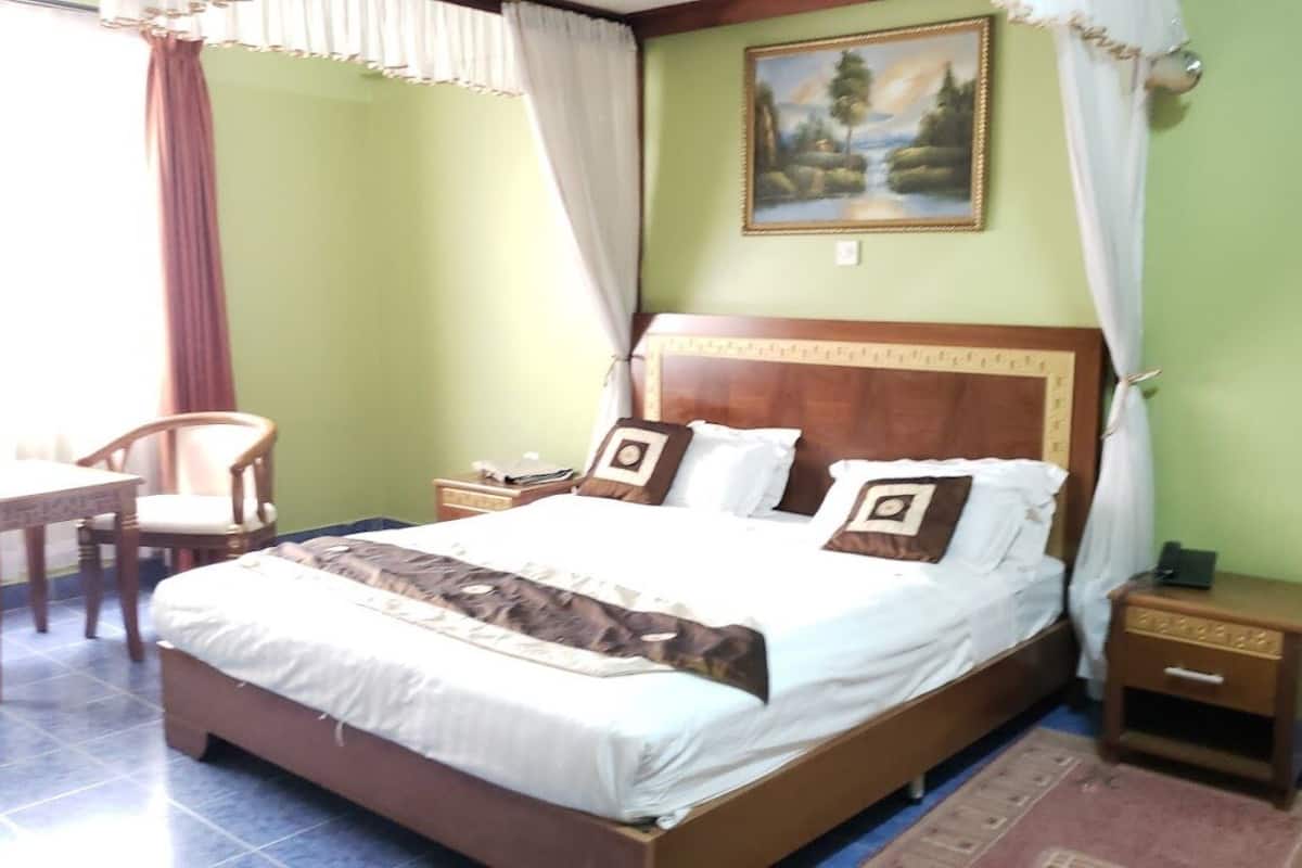 Suite ejecutiva | Wifi gratis y ropa de cama