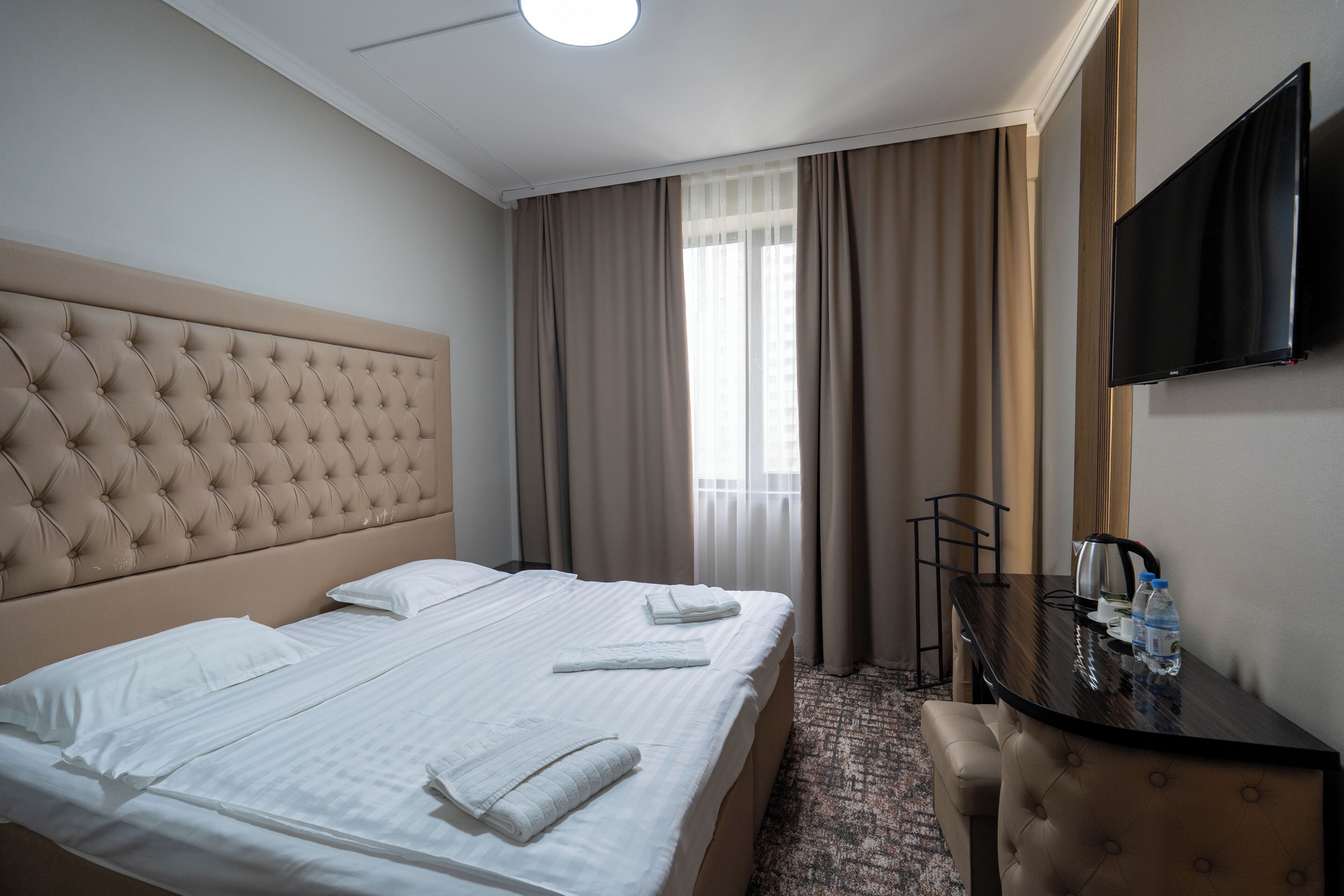 Deluxe Room | Premium bedding, down comforters, in-room safe, iron/ironing board