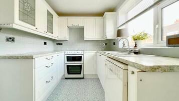 Fridge, dishwasher, toaster, cookware/dishes/utensils