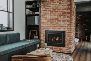 TV, fireplace, books, stereo