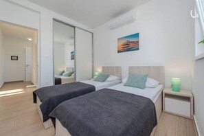 2 chambres, fer et planche à repasser, Wi-Fi, draps fournis