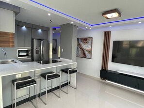 Microwave, stovetop, coffee/tea maker, toaster