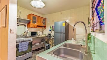 Fridge, microwave, coffee/tea maker, toaster