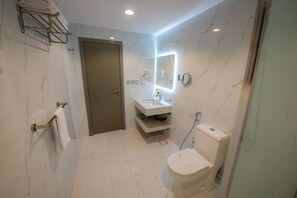 Shower, hair dryer, bathrobes, slippers - Neema Hotel Apartment  (Al Wajh)