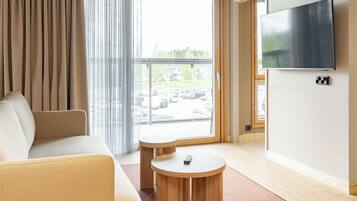 Desk, blackout drapes, bed sheets