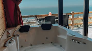 Deluxe Bungalow, Balcony, Sea View | Bathroom | Free toiletries, hair dryer, towels, soap