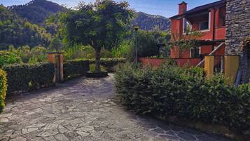 House, 1 Bedroom, Balcony, Garden View | Property grounds