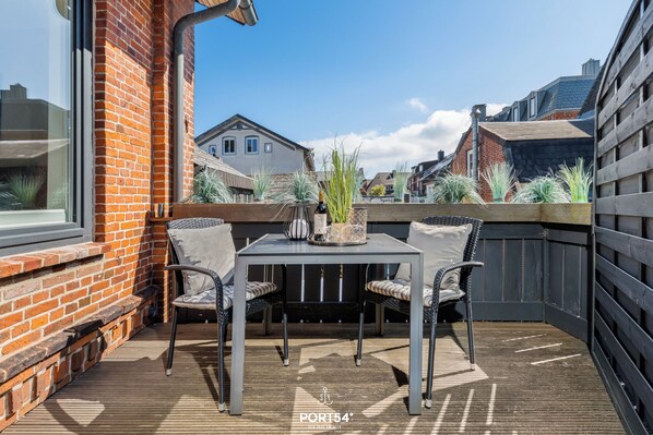 Outdoor dining - City pearl Silver in the heart of Westerland with roof terrace and close to the beach (Sylt)