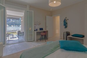 1 bedroom, iron/ironing board - GuestHost - A modern 83 sqm ground floor apartment, ideal for two people, with direct access to Lake Como!The property is located in Lezzeno (Carvagnana), conveniently located for amenities and featuring private parking.The apartment comprises a living r (Carvagnana)