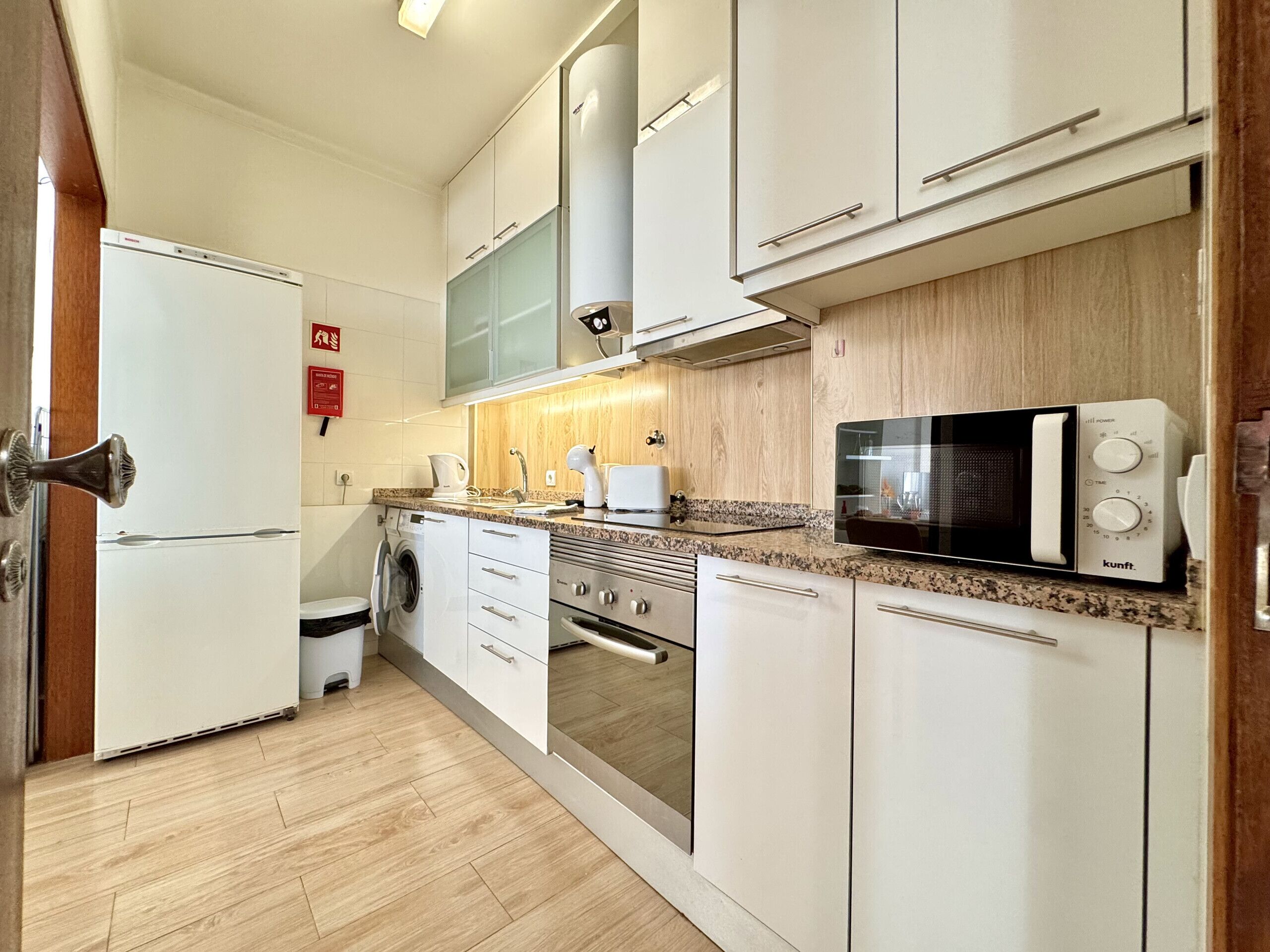 Microwave, coffee/tea maker, cookware/dishes/utensils