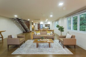 Family Apartment, 3 Bedrooms, Balcony, Sea View | Living area | Flat-screen TV - Vine and Canopy (Morong)