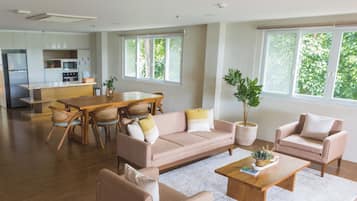 Family Apartment, 3 Bedrooms, Balcony, Sea View | Living area | Flat-screen TV