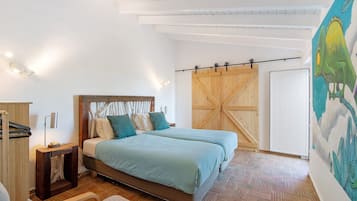 Een strijkplank/strijkijzer, wifi, beddengoed, rolstoeltoegang