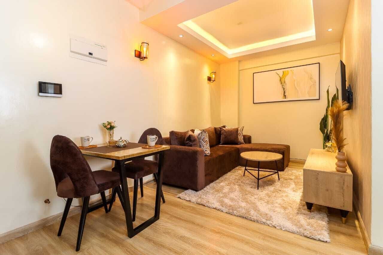 Classic Apartment, Patio, City View | Living area | 55-inch Smart TV with cable channels, Netflix, first-run movies