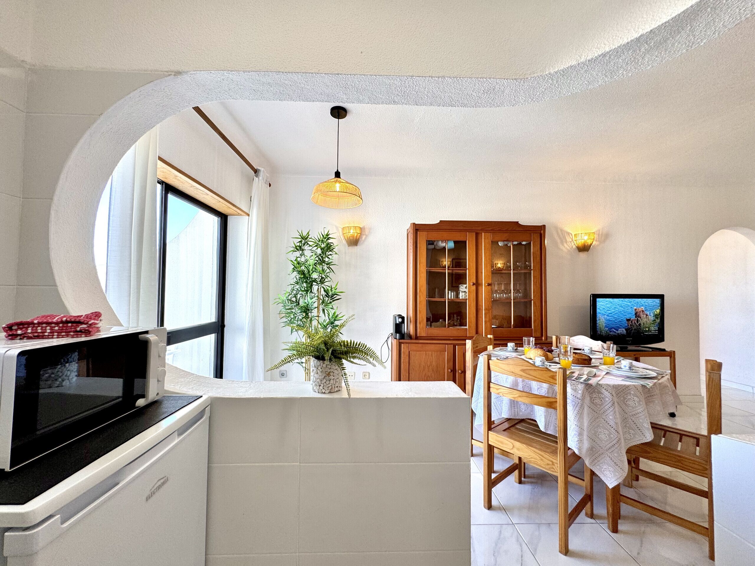 Microwave, coffee/tea maker, cookware/dishes/utensils