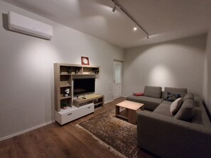 Family Apartment, Balcony, Resort View | Living area