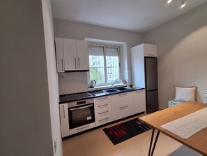 Family Apartment, Balcony, Resort View | Private kitchen