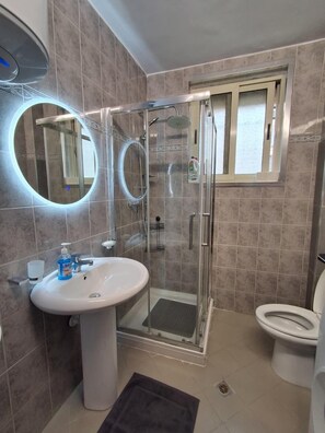Family Apartment, Balcony, Resort View | Bathroom | Shower, towels, soap, shampoo - AR Hotel (Tirana)