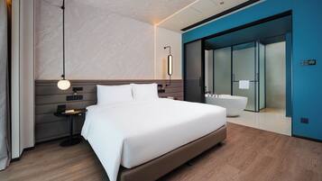 Premium bedding, down duvets, pillow-top beds, in-room safe