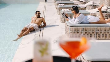 Outdoor pool, pool umbrellas, pool loungers