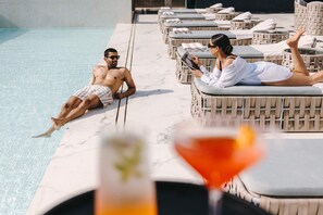 Outdoor pool, pool umbrellas, pool loungers
