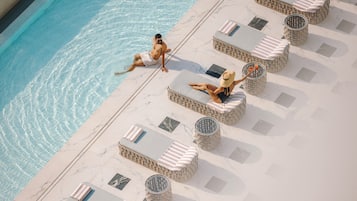 Outdoor pool, pool umbrellas, pool loungers