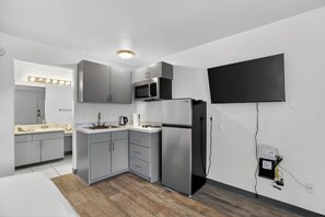 Fridge, microwave, stovetop, coffee/tea maker - Modern renovated studio offering comfort and style (Las Vegas)