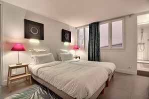 3 habitaciones, tabla de planchar con plancha, wifi y ropa de cama 
