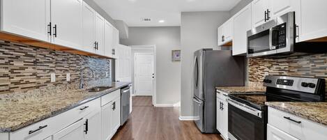 House, 4 Bedrooms | Private kitchen | Fridge, oven, coffee/tea maker, toaster