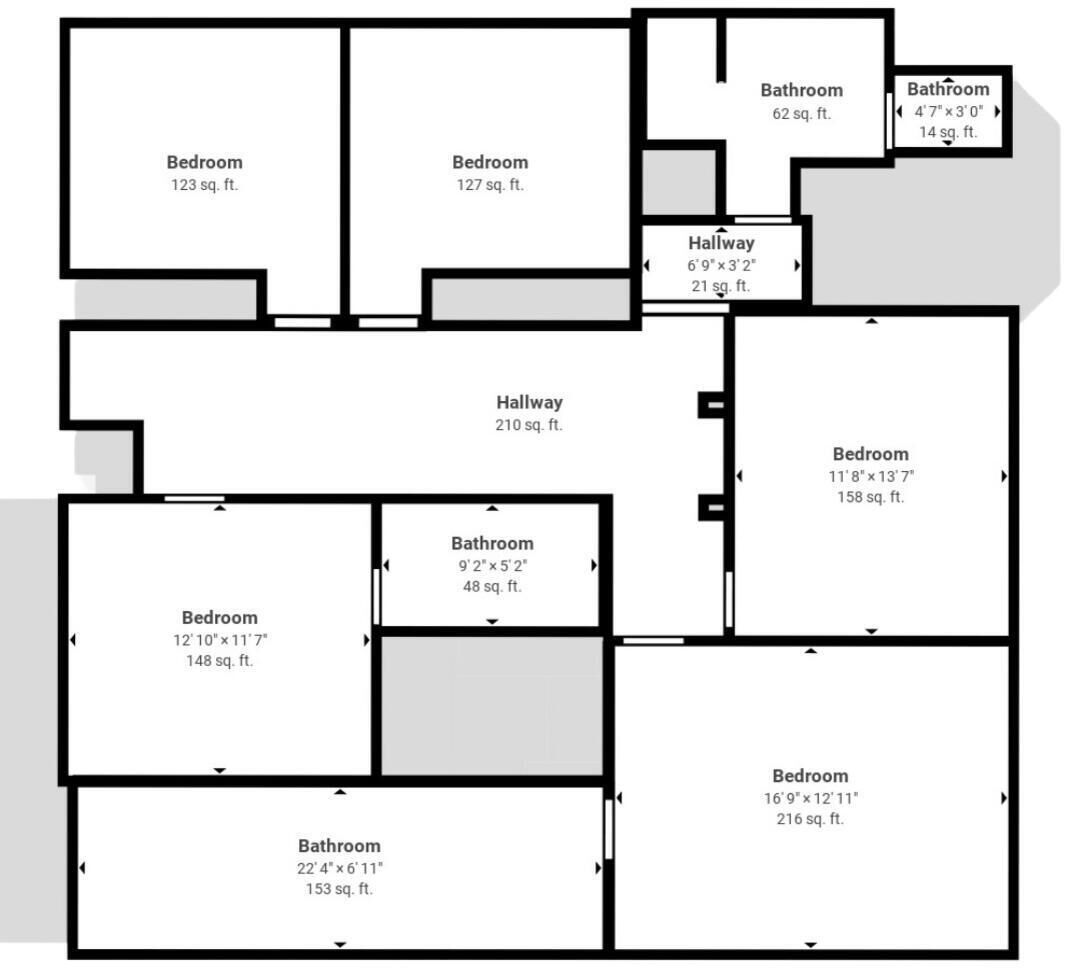 A floor plan with multiple bedrooms, bathrooms, and hallways.