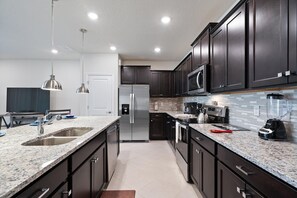 Townhome, 5 Bedrooms | Private kitchen | Fridge, oven, coffee/tea maker, toaster - Windsor Cay Resort 5 Bedroom Townhome with Pool 5 Townhouse (Clermont)