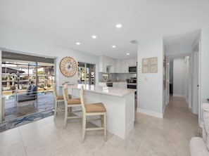 Fridge, microwave, oven, stovetop - 🌊 Waterfront Escape | Canal-Front Retreat w/ Private Pool (Naples)