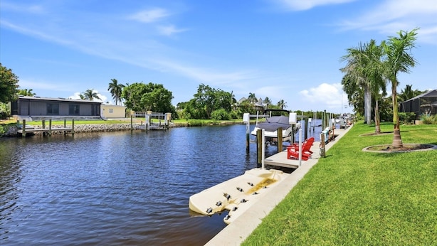 House, 3 Bedrooms | Property grounds - Punta Gorda 3-Bedroom Canalfront Pool Vacation Home with Dock 3 Home (Punta Gorda)