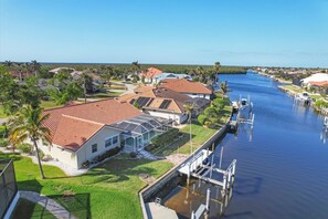 House, 3 Bedrooms | Exterior - Punta Gorda 3-Bedroom Canalfront Pool Home with Dock 3 Home (Punta Gorda)