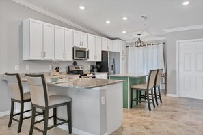 Condo, 2 Bedrooms | Private kitchen | Fridge, oven, coffee/tea maker, toaster - Heritage Landing Golf Club 30 night minimum 2 Bedroom Condo Transfer Included 2 Condo (Punta Gorda)